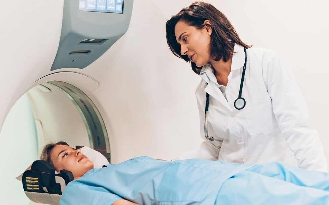 Female doctor preparing a patient for an MRI scan, illustrating a scenario where someone might ask, "Can I use HSA to pay for MRI?"