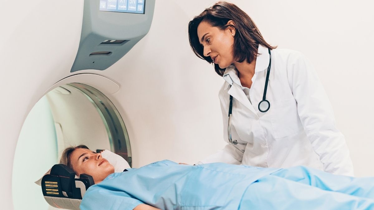 Female doctor preparing a patient for an MRI scan, illustrating a scenario where someone might ask, can i use hsa to pay for mri