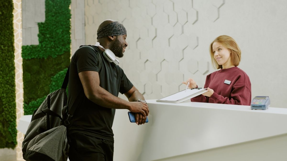 Male gym goer registering for a gym membership using HSA