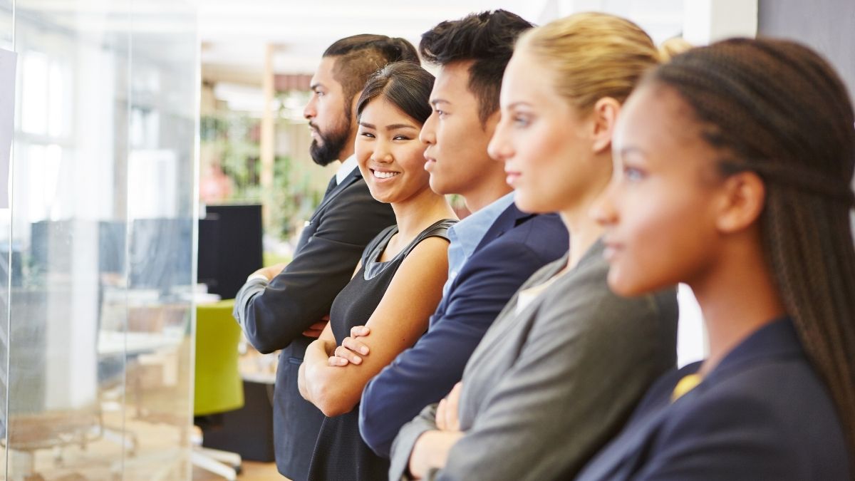 Individual vs group health insurance diverse business team evaluating coverage options.